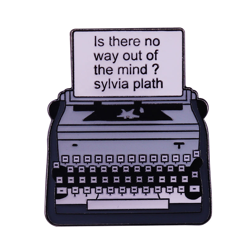front view of Sylvia Plath'S Gray Typewriter Pin