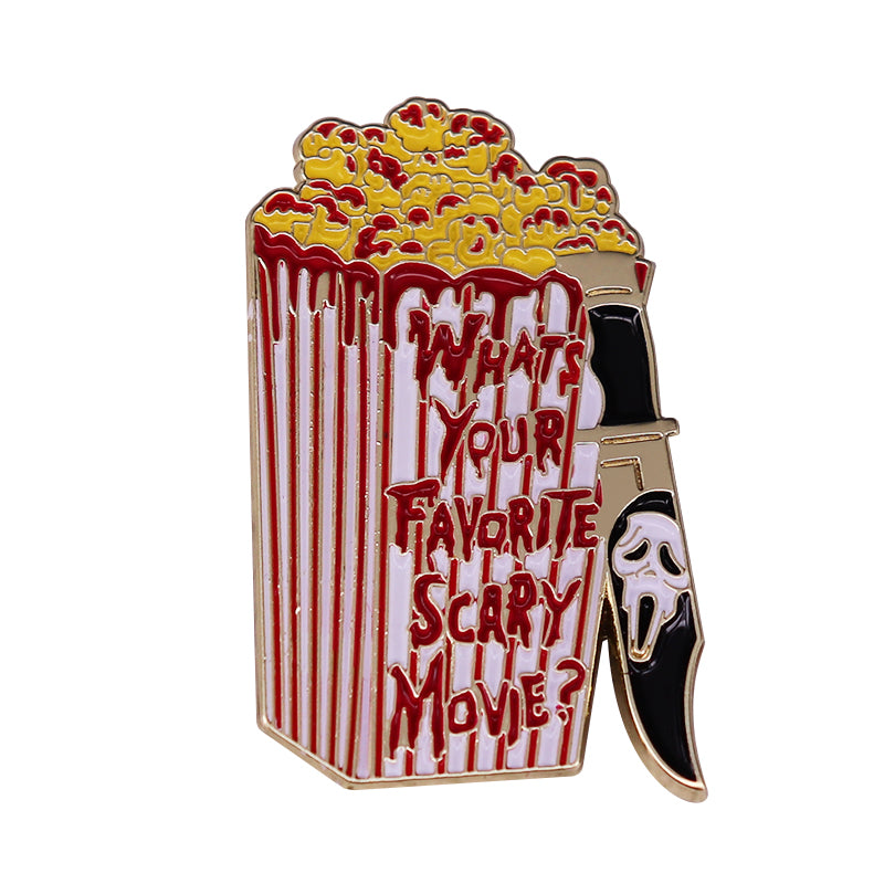 front view of Popcorn Skull Killer Pin