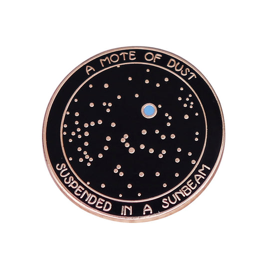 front view of "A Grain Of Dust Suspended In Sunlight" Circle Pin