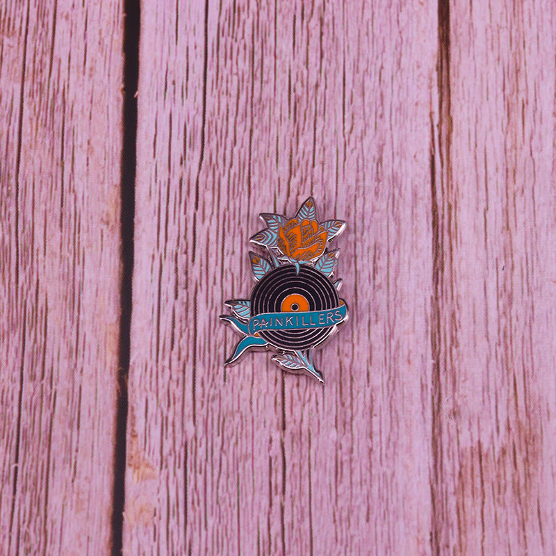 Painkiller Glamour Records Pin