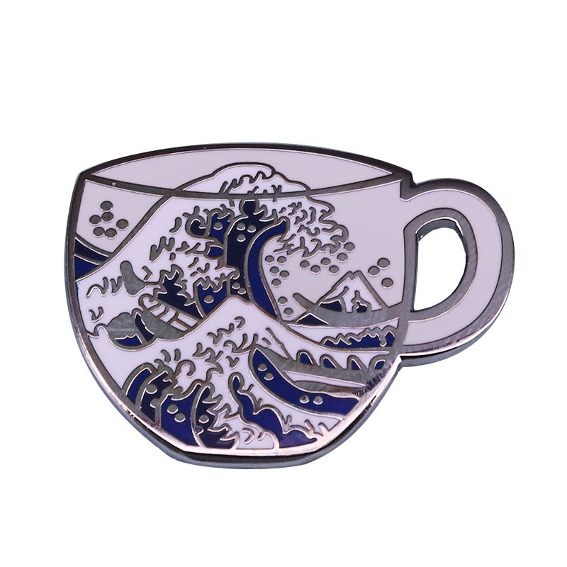 front view of The Great Wave Off Kanagawa In A Cup Pin