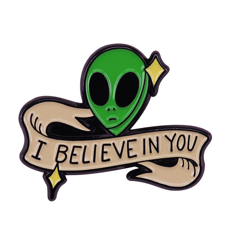front view of Believe In You Alien Pin